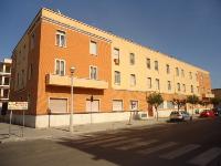 Descrizione: Ingresso, corridoio, 3 camere, cucina e bagno + locale cantina e posto auto coperto. Mq. 103. Identificativi catastali: Foglio 109, part. 44, sub.30  con cantina  foglio 109, part. 44, sub. 45 e posto auto coperto foglio 109, part. 44, sub. 53