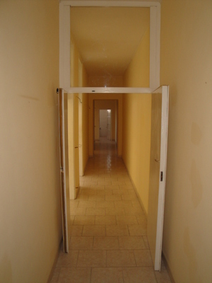 Descrizione: Ingresso, corridoio, 3 camere, cucina bagno e ripostiglio + locale cantina. Mq. 105. Identificativi catastali: Foglio 109, part. 44, sub. 18 con cantina  foglio 109, part. 44, sub. 41