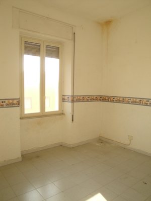 Descrizione: Ingresso, corridoio, 2 camere, cucina e bagno + locale cantina. Mq. 80. Identificativi catastali: Foglio 109, part. 44, sub. 35  con cantina  foglio 109, part. 44, sub. 44