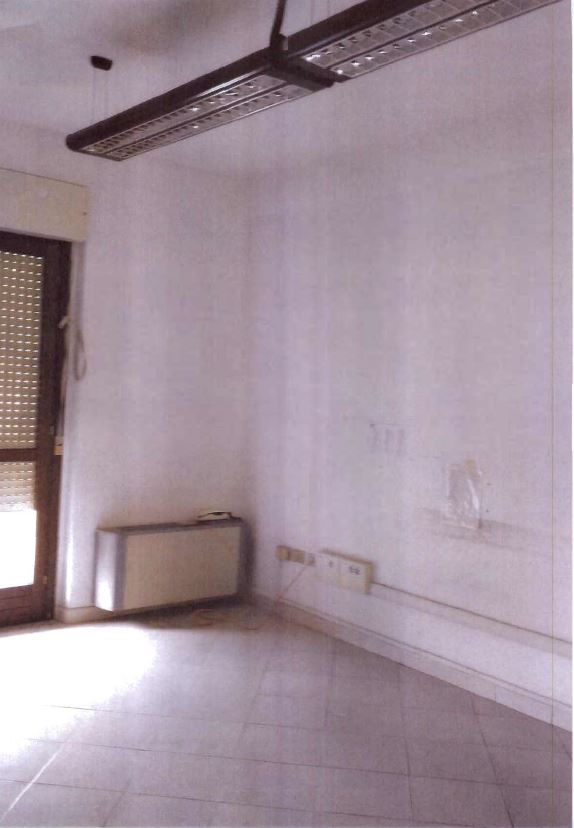 Atrio, ingresso esclusivo, guardiola, locale archivi, locale centrale termica ed elettrica, un servizio, vano scala e ascensore di proprietà esclusiva - destinazione d'uso_ ufficio pubblico. N.C.E.U. foglio 33 part. 1025,sub. 47