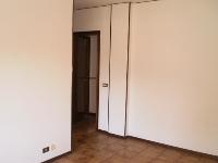 Immobile composto da Soggiorno, cucina, bagno, 2 camere, poggiolo e Box auto e cantina. Identificativi Catastali [N.C.E.U.] cat. A3 foglio 31 part. 696 sub. 57, con box auto ad uso esclusivo al foglio 31 part. 696 sub. 69 e cantina ad uso esclusivo al foglio 31 part. 696 sub. 88