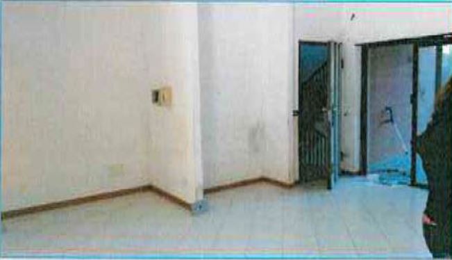 Appartamento composto da soggiorno, cucina, disimpegno, 2 camere, 2 bagni di cui uno cieco, 2 giardini su entrambi i lati della proprietà + cantina piano S1 int. 1/B - box auto piano S1 n. 9. Identificativi Catastali - [N.C.E.U.] Unità Residenziale cat. A/2 foglio 37 part. 1754 sub 4 - graffata sub 8 - graffata part.1756 sub 52 - Unità Secondaria cat. C/2 foglio 37 part. 1756 sub 19 - Unità Secondaria cat. C/6 foglio 37 part. 1756 sub 37