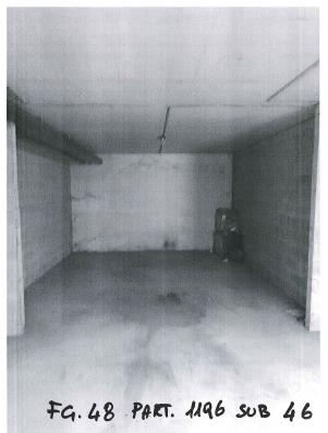 posto auto coperto in autorimessa interrata. Identificativi Catastali - [N.C.E.U.] Unità non Residenziale cat. C/6 foglio 48 (ex G/6) part. 1196 sub 46 rendita 90,9