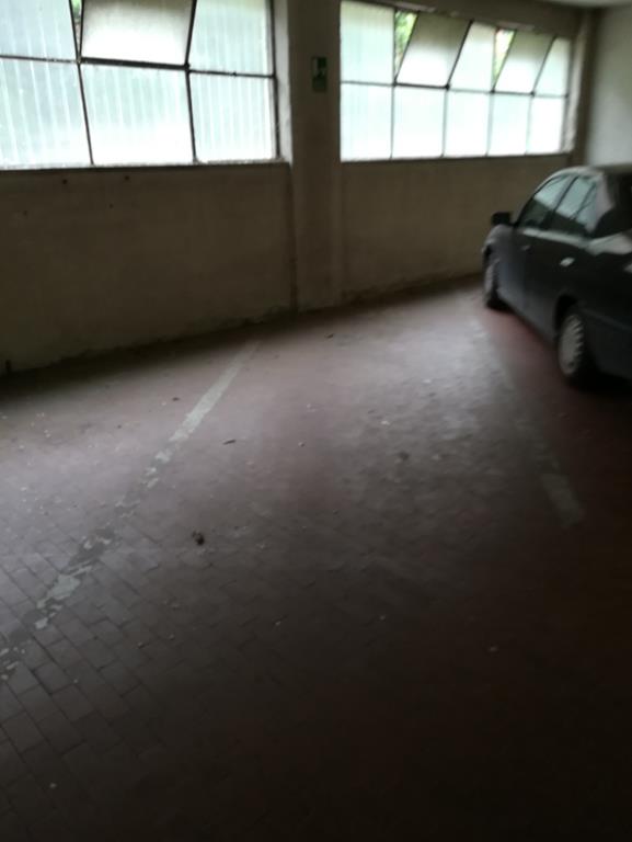 Posto auto coperto piano terra in autorimessa condominiale. Identificativi Catastali - [N.C.E.U.] Unità non Residenziale cat. C/6 foglio 1 (ex VE/1) part. 1194 sub 287 rendita 44,42