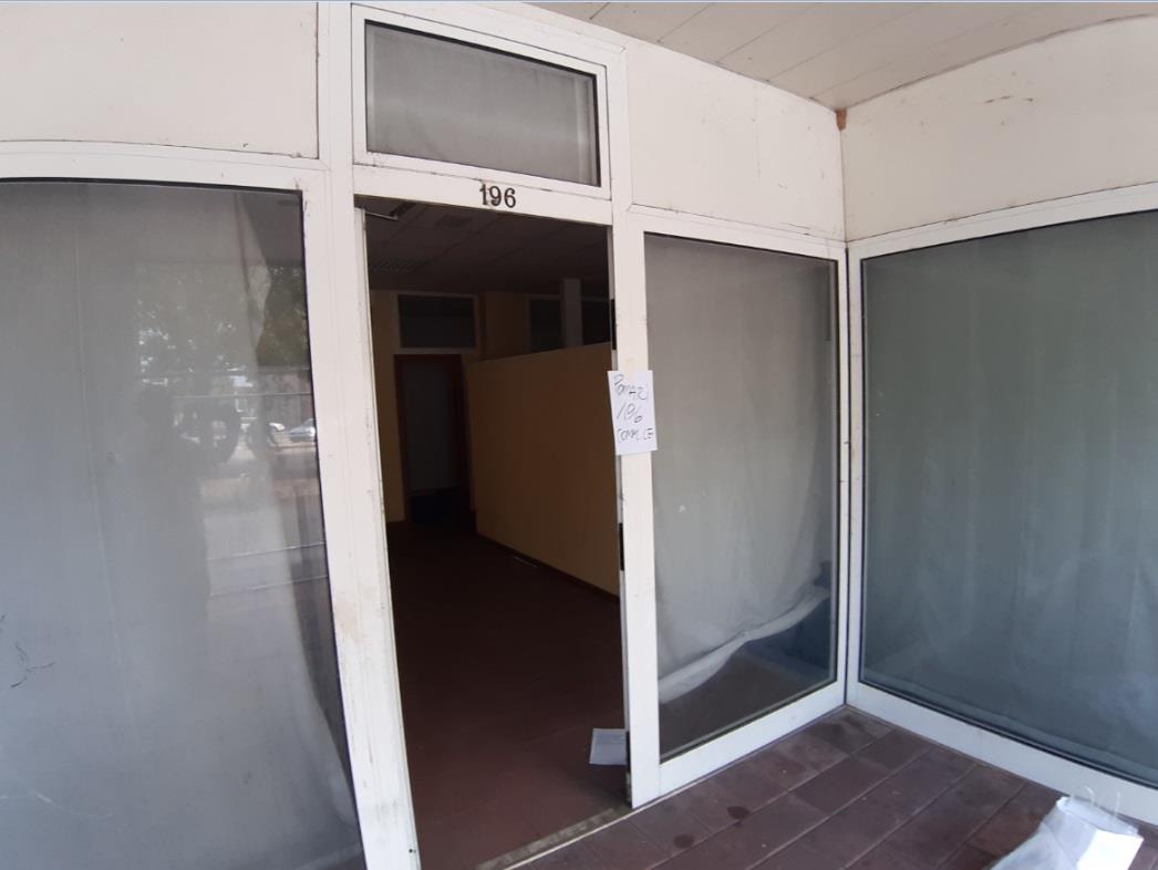 Negozio al piano terra con superficie di vendita di mq 79 oltre ad una cantina di mq 6 ed una cantina di mq 5 identificate con sub catastale separato + box auto in autorimessa interrata condominiale dotata di certificato antincendio. Identificativi Catastali [N.C.E.U.]: unità non residenziale cat. C/1 foglio 48 (ex G/6) part. 1196 sub 144 rendita 1385,76, unità secondaria cat. C/2 foglio 48 (ex G/6) part. 1196 sub 32 rendita 16,42 , unità secondaria cat. C/2 foglio 48 (ex G/6) part. 1196 sub 80 rendita 13,69 e unità secondaria cat. C/6 foglio 48 (ex G/6) part. 1196 sub 90 rendita 66,11