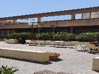 Negozio su 2 livelli, piano terra con WC ed antibagno, dotato di scala interna al piano primo con WC e ampio terrazzo coperto N.C.E.U. Unità Principale cat. C/1 sez. VIC foglio 7 part. 169 sub 116