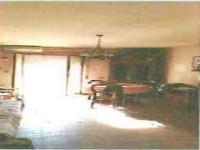 Ingresso, corridoio, salone, disimpegno, cucina, bagno, camera e 2 balconi N.C.E.U. Unità Residenziale cat. A/2 foglio 648, part. 325, sub. 57 + pertinenziale posto auto coperto n. 8 piano terra N.C.E.U. unità secondaria cat. C/6 foglio 648, part. 325, sub 550