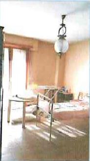 Ingresso, corridoio, salone, disimpegno, cucina, bagno, camera e 2 balconi N.C.E.U. Unità Residenziale cat. A/2 foglio 648, part. 325, sub. 57 + pertinenziale posto auto coperto n. 8 piano terra N.C.E.U. unità secondaria cat. C/6 foglio 648, part. 325, sub 550