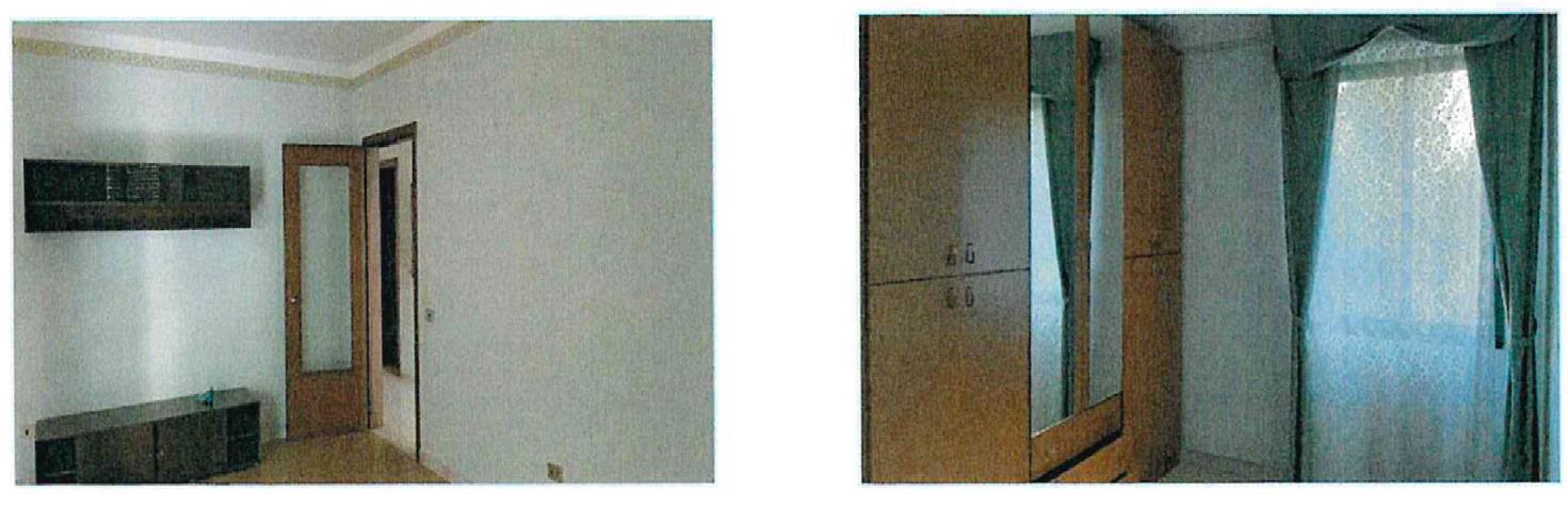 Appartamento con affaccio su due fronti composto da ingresso, soggiorno-pranzo, cucina, ripostiglio, disimpegno, tre camere da letto, due bagni privi di areazione naturale, una loggia ed un balcone. L'unità si trova in normali condizioni manutentive. Iimpianto di riscaldamento di tipo autonomo. Posto auto scoperto piano terra. Identificativi Catastali [N.C.E.U.] Unità Residenziale cat. A/2 foglio 36 part. 1399 sub 18  - Unità Secondaria cat. C/6 foglio 36 part. 1016 sub 18. Sup. (arr.) mq catastali 137  mq catastali 12