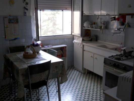 Abitazione in Roma (Ostia) Via Delle Baleari 3 (scala Pal.14/4, piano terzo, int. 10). Composto da: Ingresso, disimpegno, 4 camere, cucina, bagno, wc, ripostiglio, 2 balconi + cantina e posto auto scoperto. Identificativi [N.C.E.U.] Categoria Catastale A3 foglio 1079 part. 681 sub. 29-15 (incluso locale deposito esclusivo) e posto auto scoperto ad uso esclusivo al foglio 1079 part. 685 sub. 11. Mq 125. Libero. Piena proprietà.
