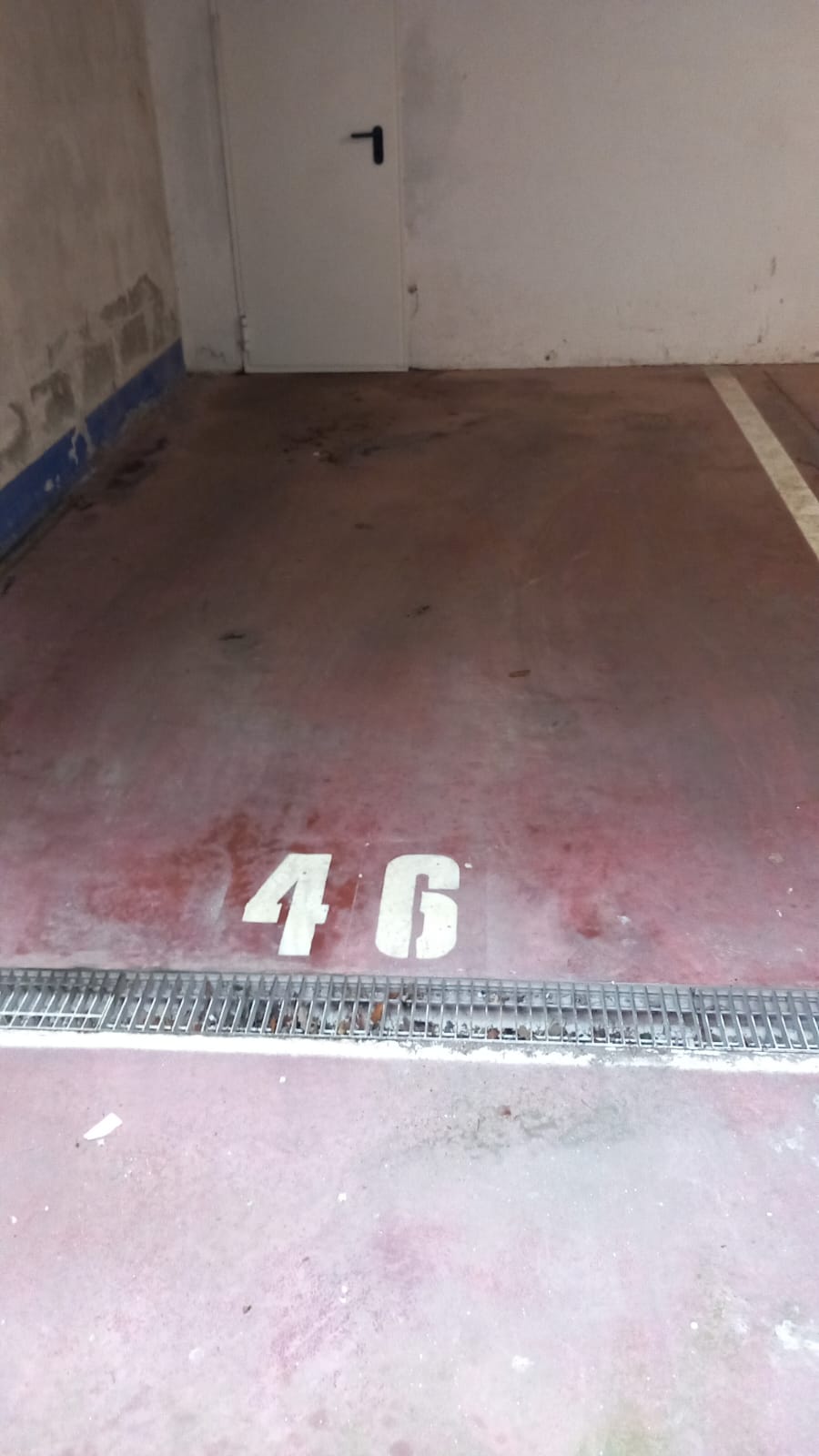 Posto auto coperto con rampa d’accesso da Largo Virgilio Brocchi n. 68, situato al piano S1 della scala C, interno 46. Id. cat. Unità Secondaria cat. C/6 foglio 853 part. 738 sub 89. Sup. mq catastali 13