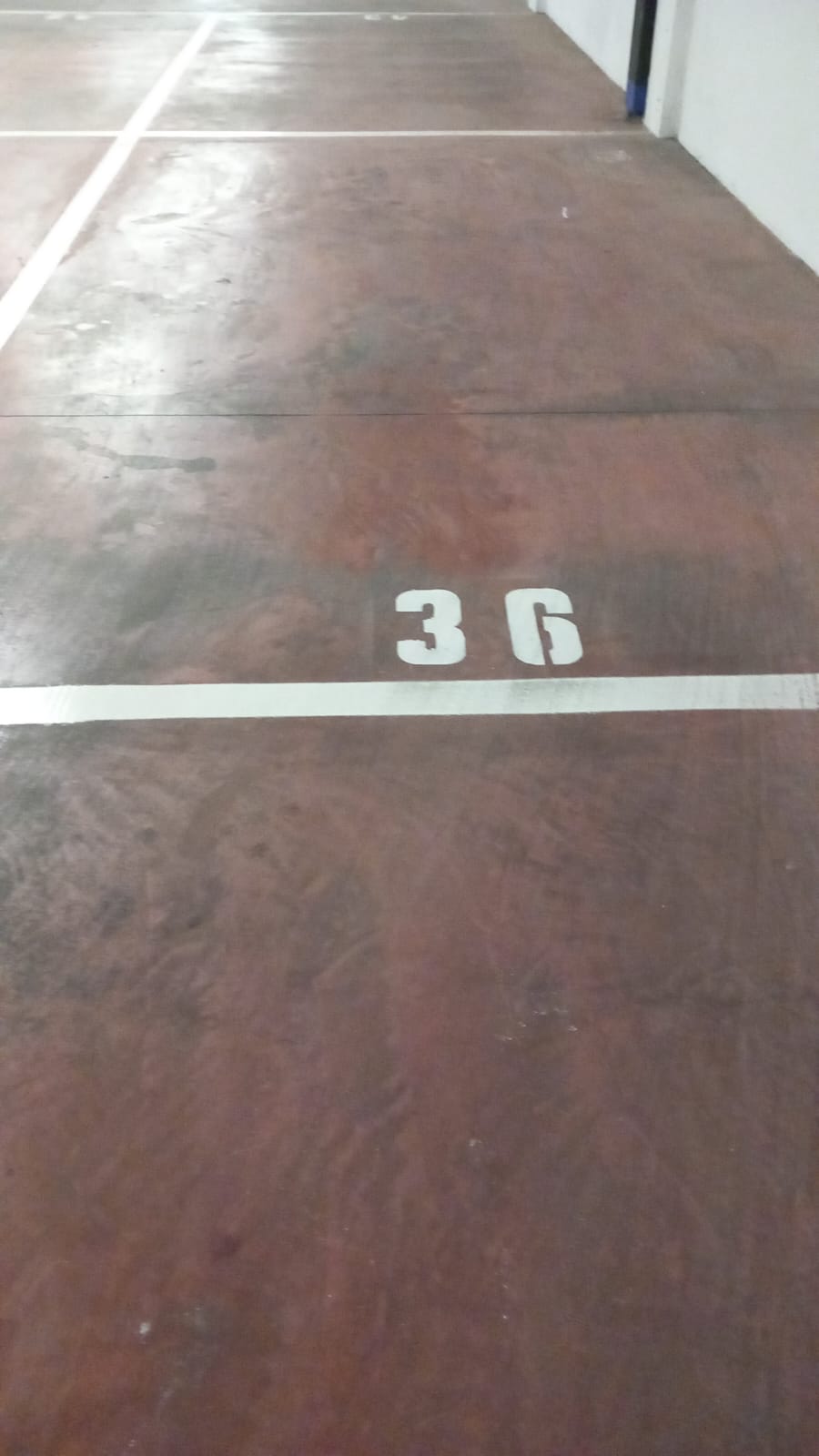 Posto auto coperto con rampa d’accesso da Largo Virgilio Brocchi n. 68, situato al piano S1 della scala B, interno 36. Id. cat. Unità Secondaria cat. C/6 foglio 853 part. 739 sub 76. Sup. mq catastali 18